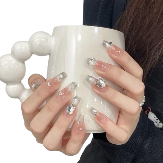 Long coffin pink press-on nails with square rhinestone design