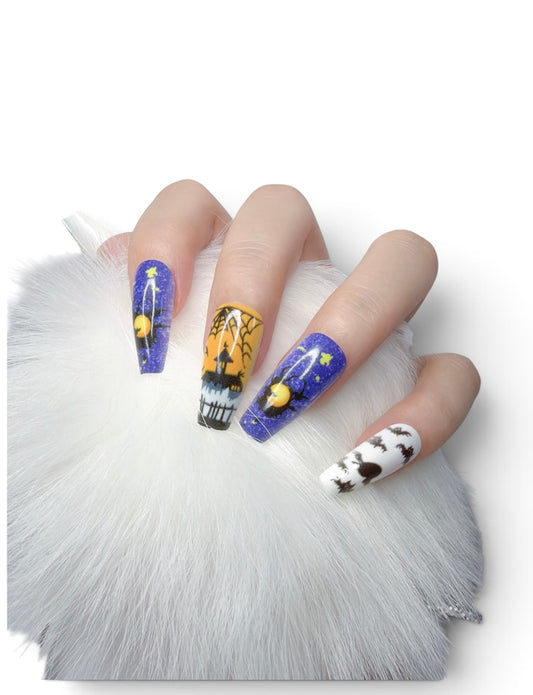 Handmade Halloween coffin press-on nails with haunted house and bat design