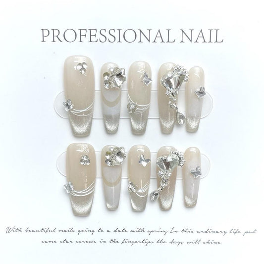 White & Silver Long Coffin Press-On Nails with Heart Rhinestone Design | Tipora