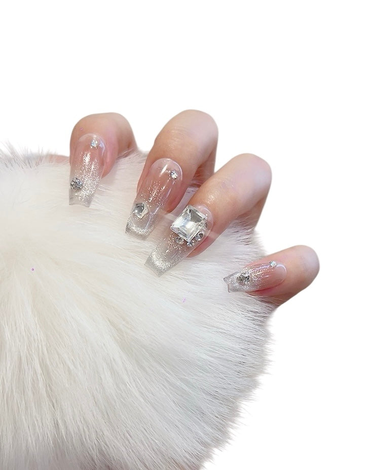 Long coffin pink press-on nails with square rhinestone design